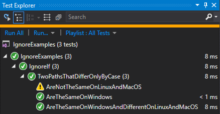 image of Visual Studio Test Explorer pain with two tests, one named "AreTheSameOnWindows" with the passed icon next to it, and one named "AreNotTheSameOnLinuxAndMacOS" with the skipped icon next to it